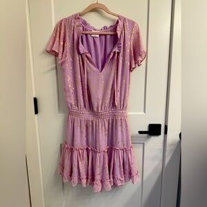 Buddy Love dress color is violet with  Gold Accents